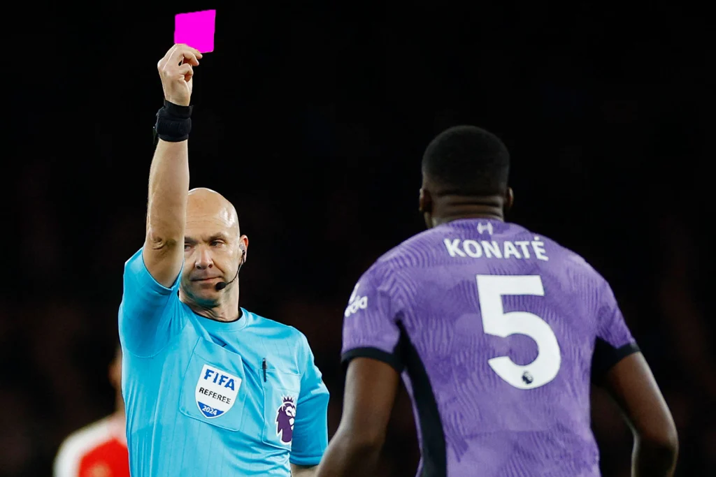 What is A Pink Card in Football? Image Credits:- The Sun.